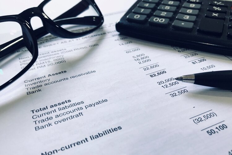 accounting-concept-calculator-and-balance-sheet-1-2021-09-26-13-45-39-utc